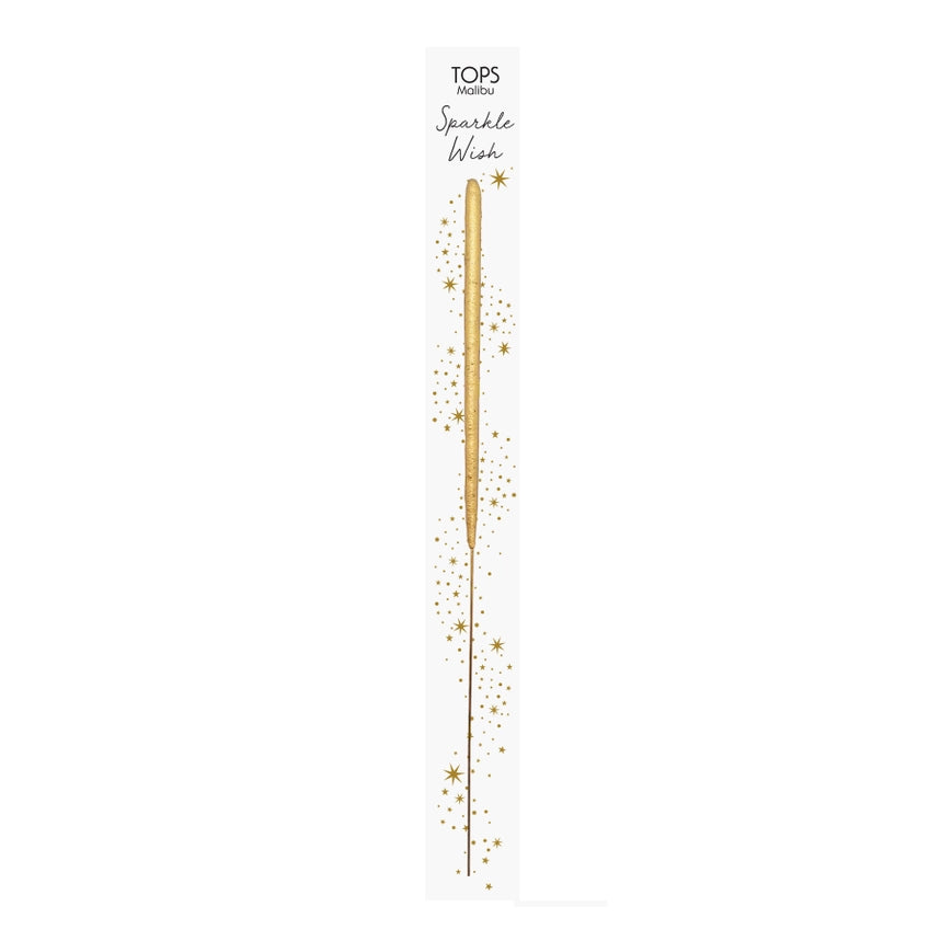 Sparkle wish sparkler wand is featured in it rectangular package white black lettering gold detail and showing the gold sparkler inside on a white background. 