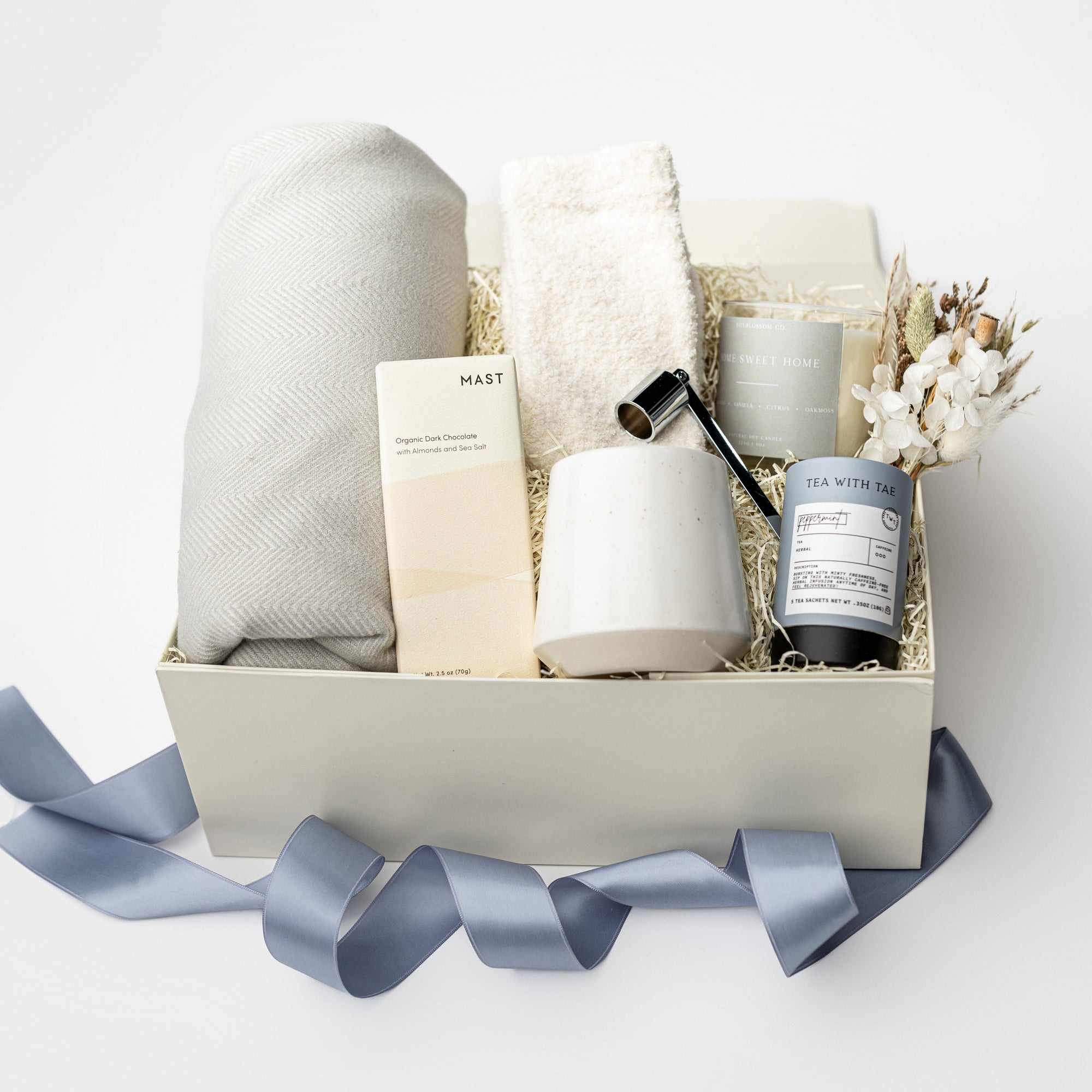 Gift box with wellness products on a white background