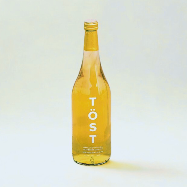Bottle of Töst on a light background