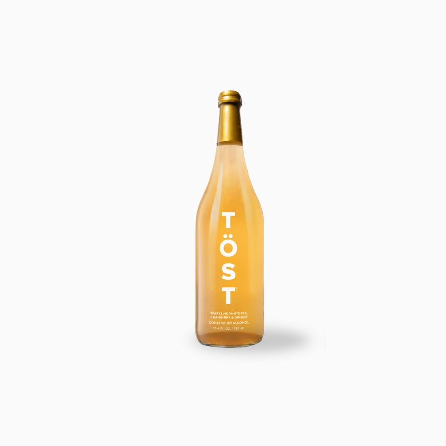 Bottle of Töst on a white background