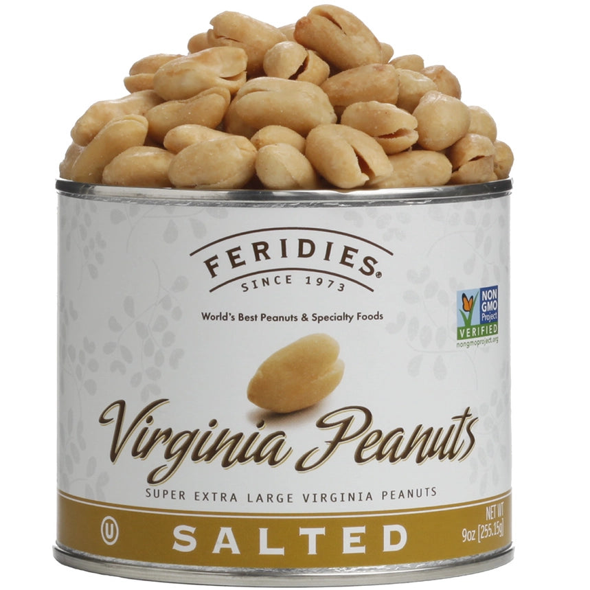 Virginia salted peanuts is featured in its round tin container with white label with gold rim on the bottom with an image of a peanut brown lettering with the information  with several beige peanuts on top on a white background.  