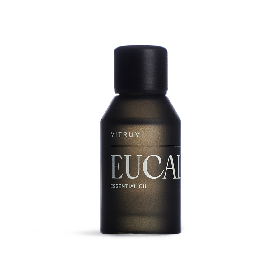 Vitruvi Eucalyptus Essential Oil featured in its black bottle with white lettering. 