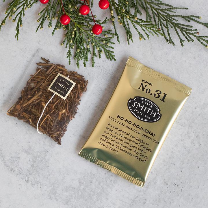 Metallic gold packet next to tea sachet