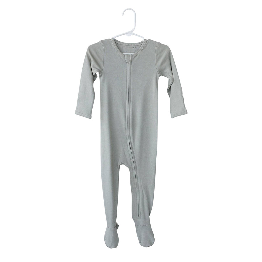 Gray baby footie gray hanging in a white hanger on a white background.