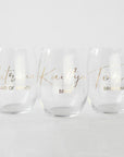 Set of personalized bridal party wine glasses with names and titles like Bride, Bridesmaid, and Maid of Honor in elegant script with personalized names. 