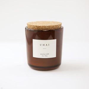 8 oz chai scented soy candle, approx 3.25" x 3.75", brown glass container with cork lid and white sticker.