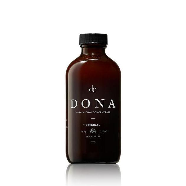 8 fl oz | 473ml Masala Chai Tea Concentrate in brown stained glass, black twist off top, white text.