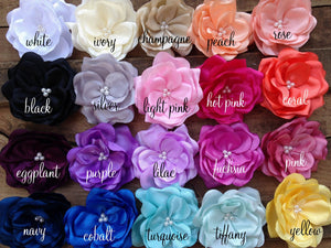 Satin flower color options. White, ivory, champagne, peach, rose, black, silver, light pink, hot pink, coral, eggplant, purple, lilac, fuchsia, pink, navy, cobalt, turquoise, tiffany, yellow