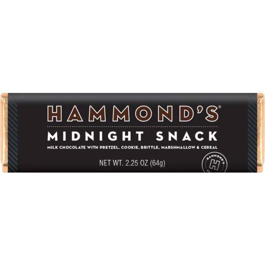 Hammond's midnight snack chocolate bar shown in its gold wrapping and black label with white lettering and brown title. 