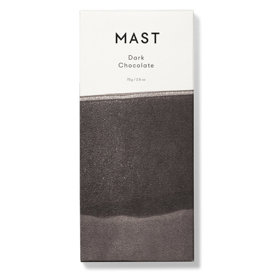 Mast Brother, Dark Chocolate Bar, wrapped in a White and shades of brown background. Label in the white part with black lettering. 