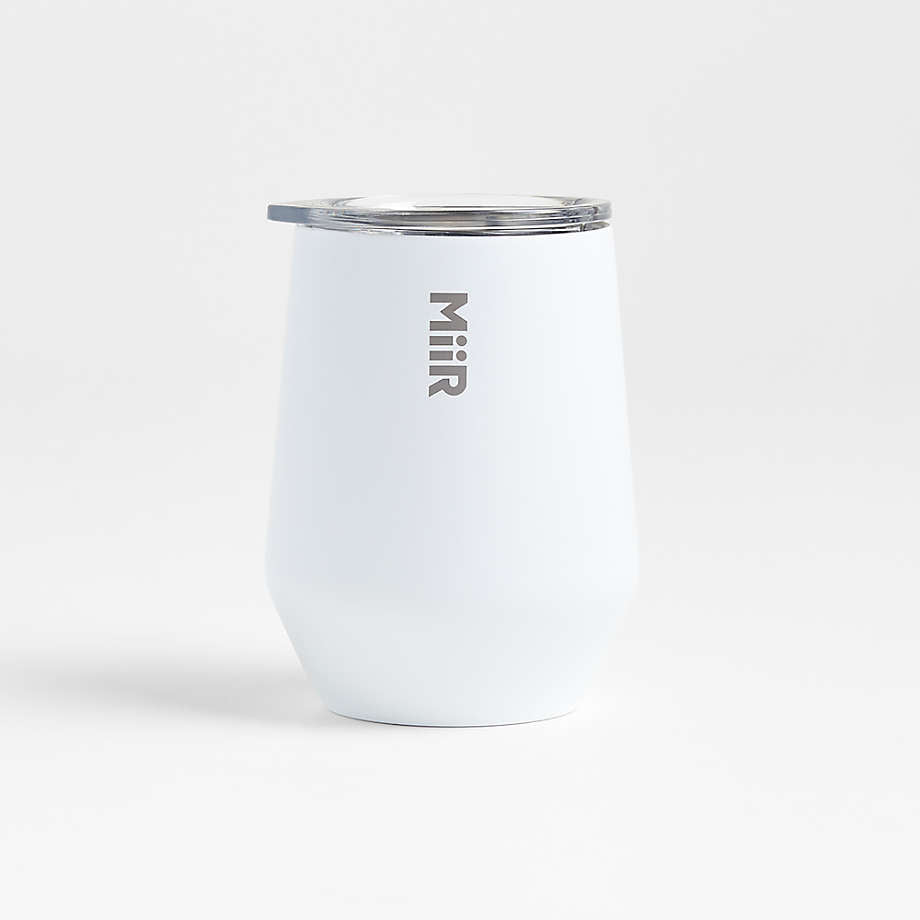 Mirr white cylindric shape tumbler with transparent lid featured on a white background.