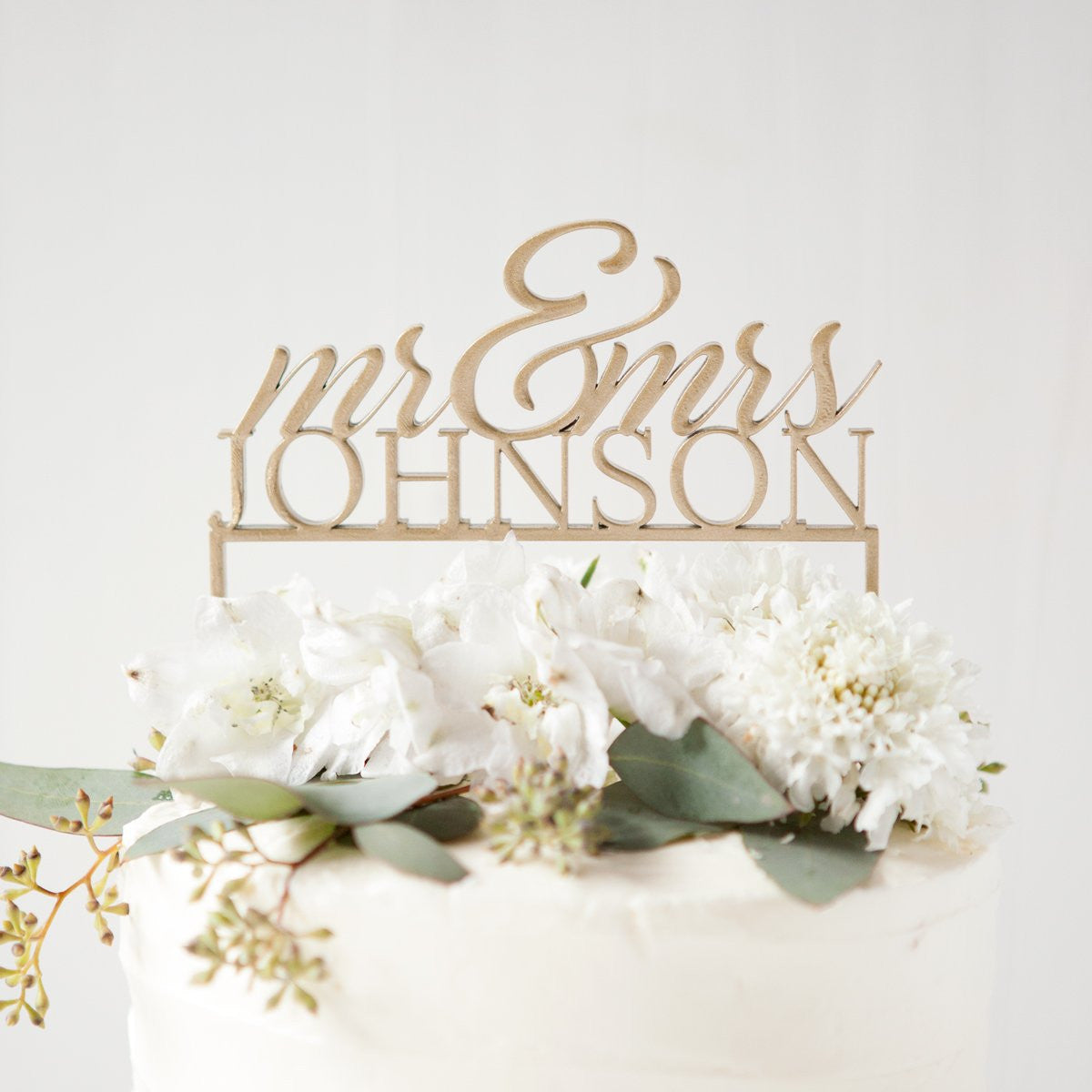monogram cake toppers, personalized wedding cakes, statement cake toppers, laser cut topper, calligraphy initial cake toppers, floral cake topper