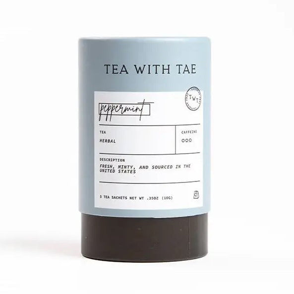 Peppermint Tea Mini Tube, a light-gray cylindrical container holds peppermint tea, featuring a label with product details.