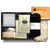 Savon Parfume Extra Pur soap in a gray wrapper. honey in a clear square jar with a silver lid, two 'No. 15' Steven Smith Teamaker packets, black 'foxblossom' cozy socks, and a Christina Maser Pantry chicken soup mixture, in a black 'foxblossom' box with black paper shread